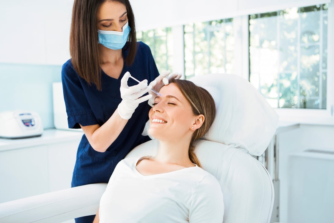 Woman receiving botox injection